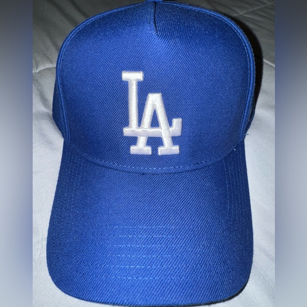 “Pre owned” LA DODGERS trucker/snapback